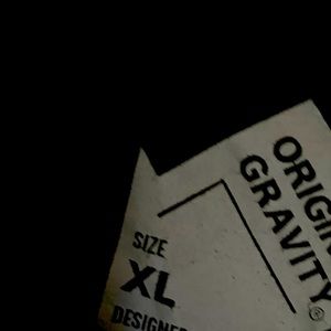 Black and white XL Original Gravity shirt. Very stylish and new quality.